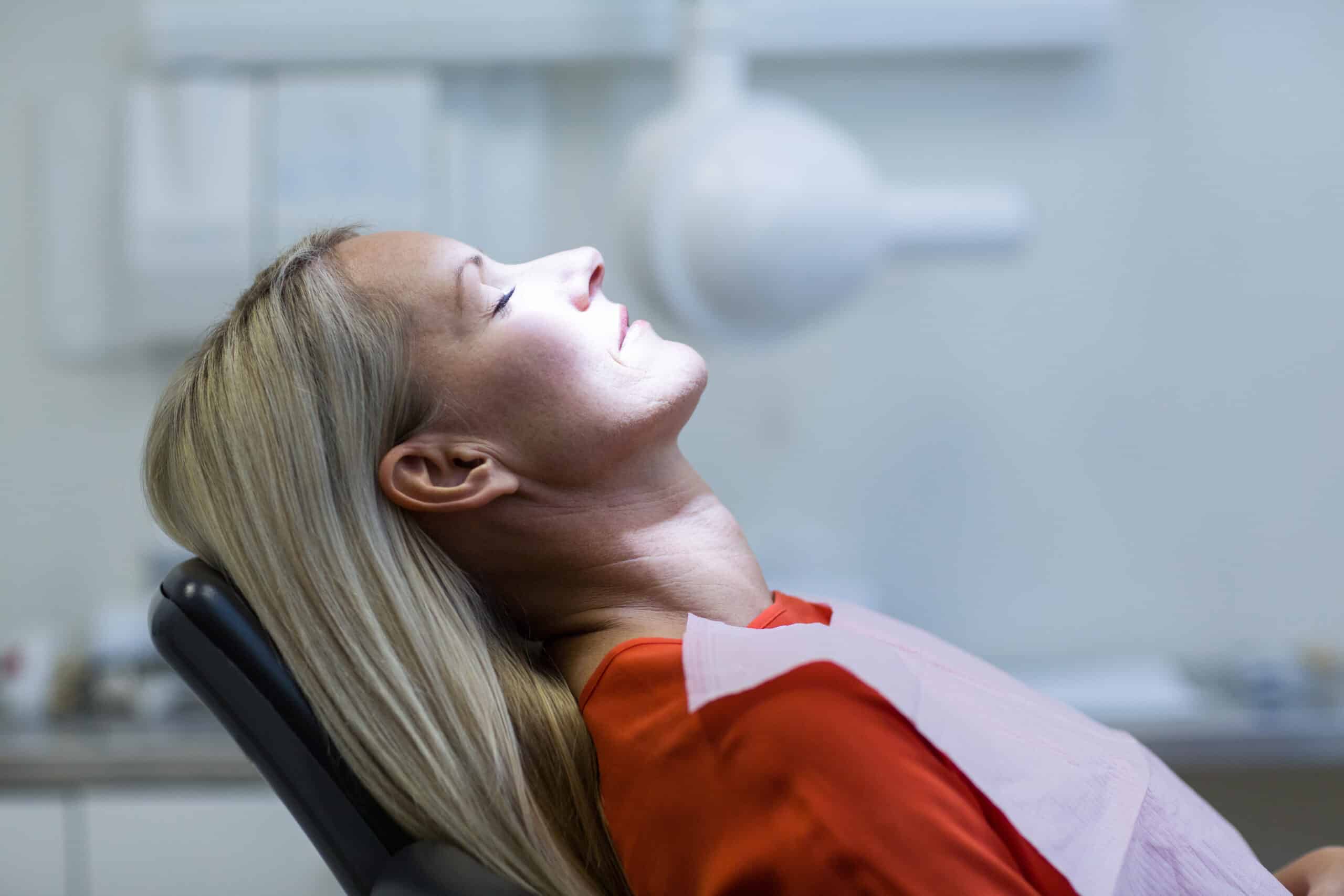 Woman,Relaxing,On,Dentist,Chair,At,Dental,Clinic