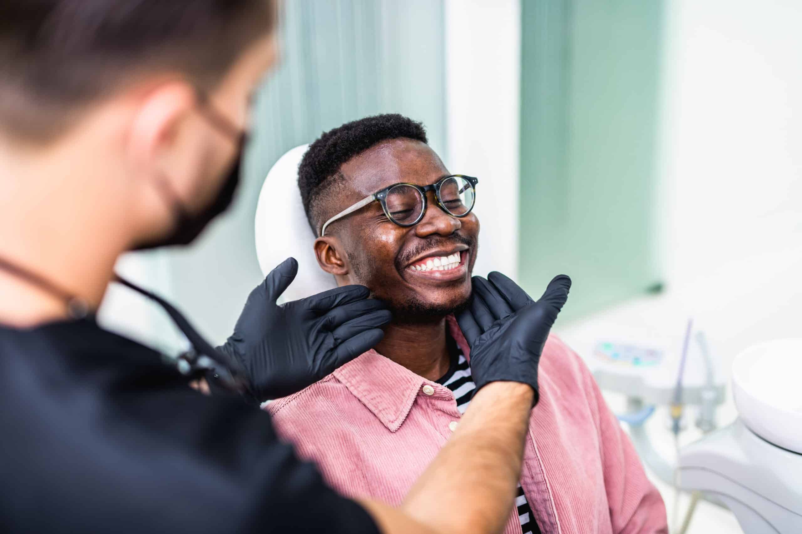 African,American,Young,Man,Having,A,Visit,At,The,Dentist's.